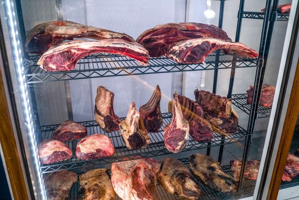 Dry-aged beef cuts stored in the dry-ageing cabinet at Third Wave BBQ
