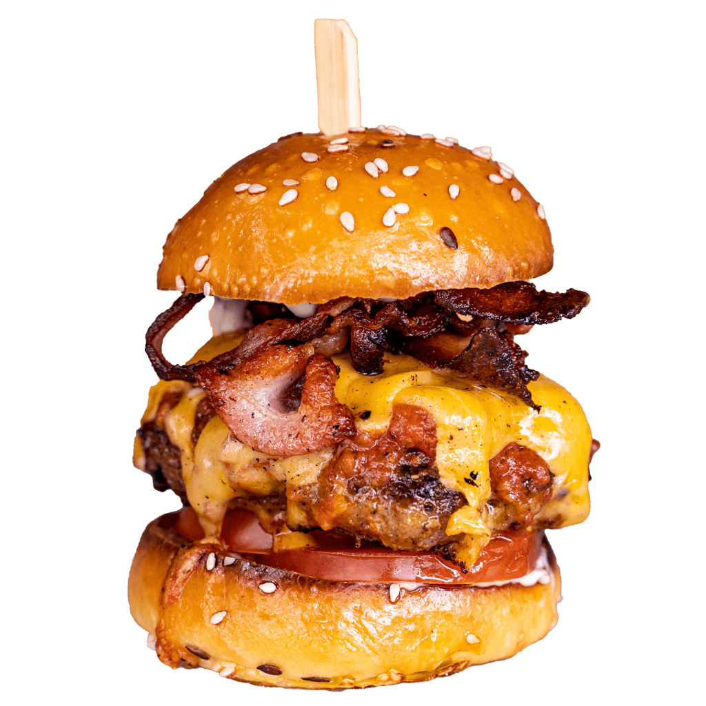 Classic slider with bacon, melted cheese and tomato on a sesame bun