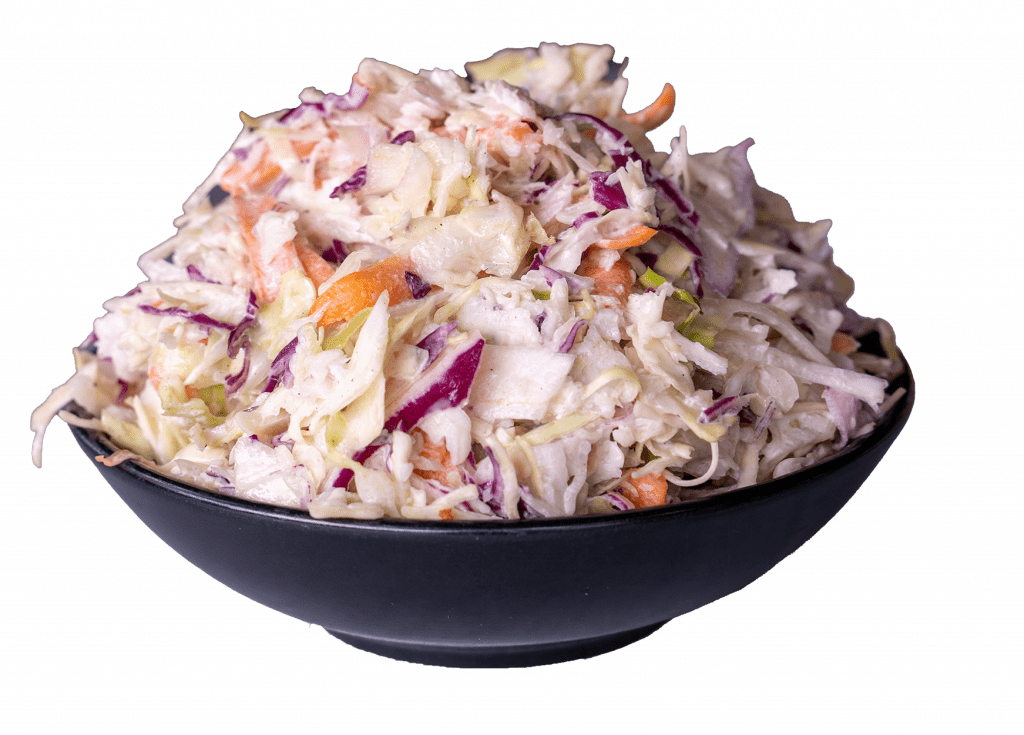 Bowl of creamy coleslaw with shredded cabbage and carrot