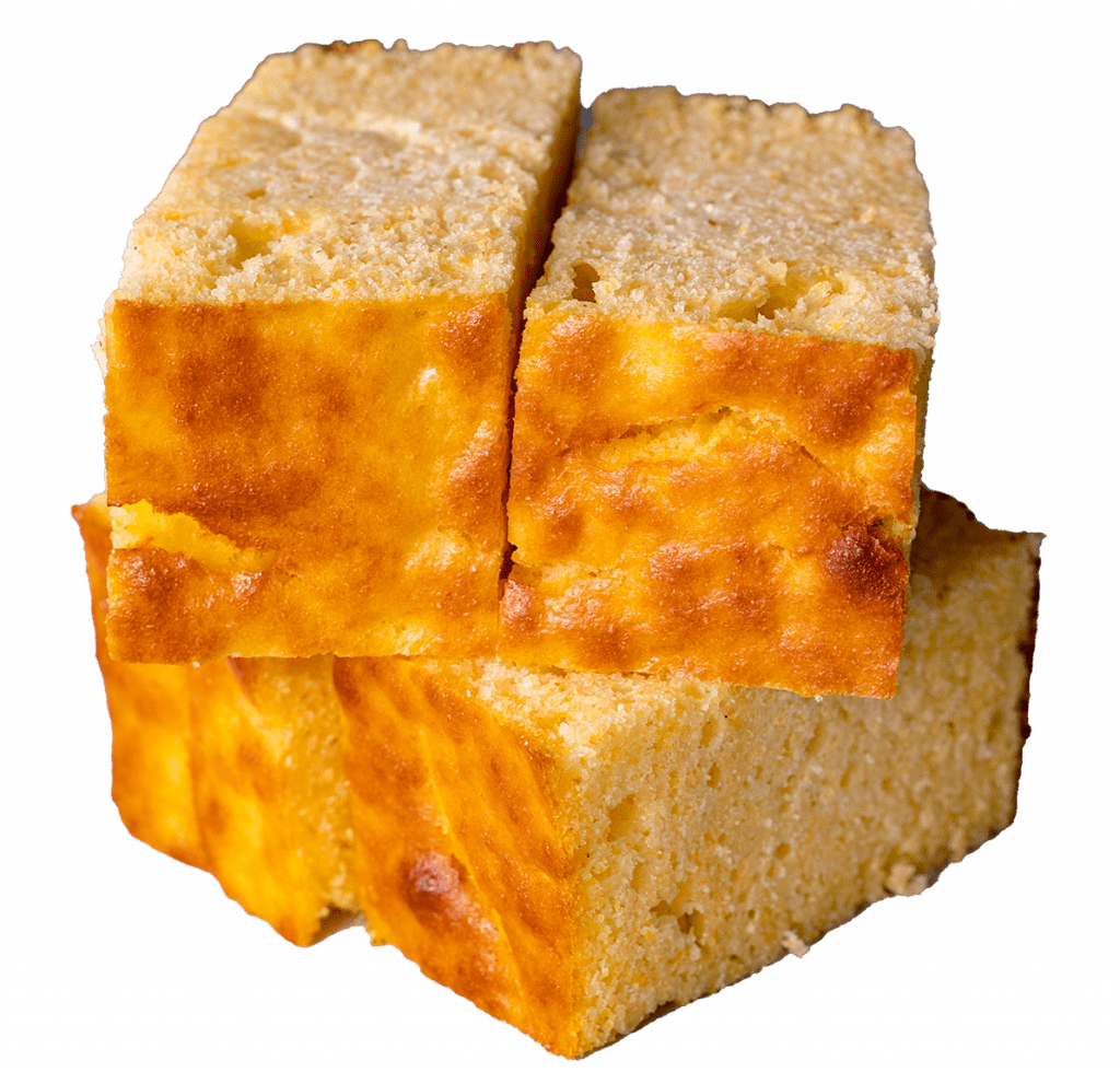 Stacked squares of cheesy cornbread