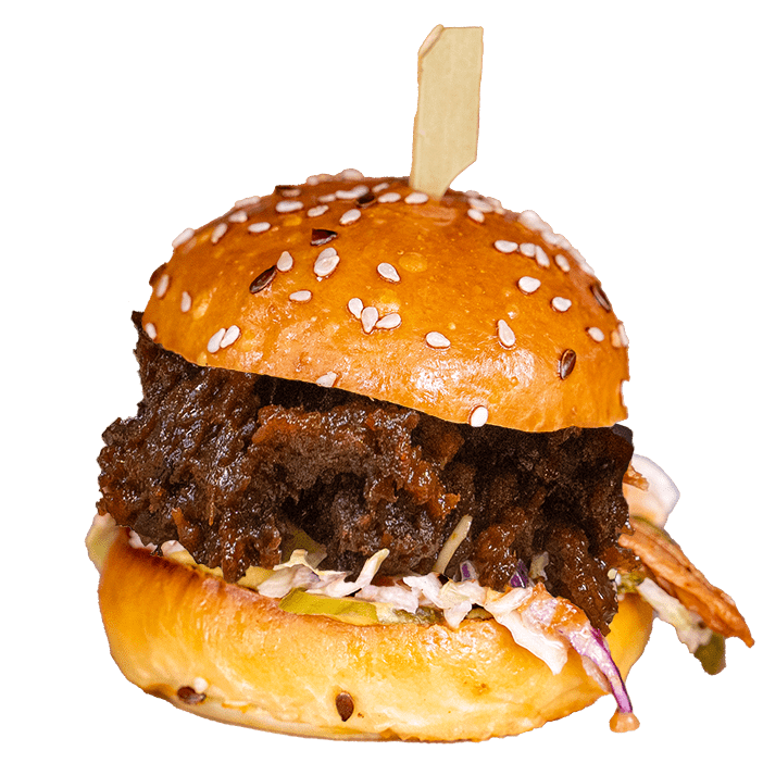 Pulled vrisket slider with coleslaw on a sesame bun