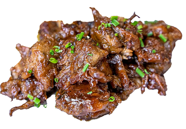 Chopped vrisket garnished with chives on a plate