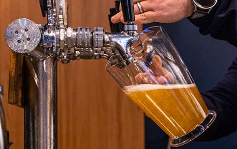 Beer being poured from a tap