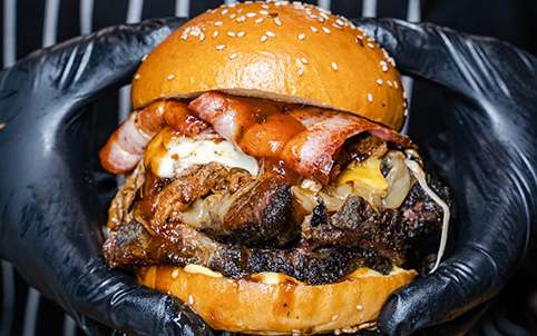 Oh Mamma burger stacked with brisket, bacon and cheese