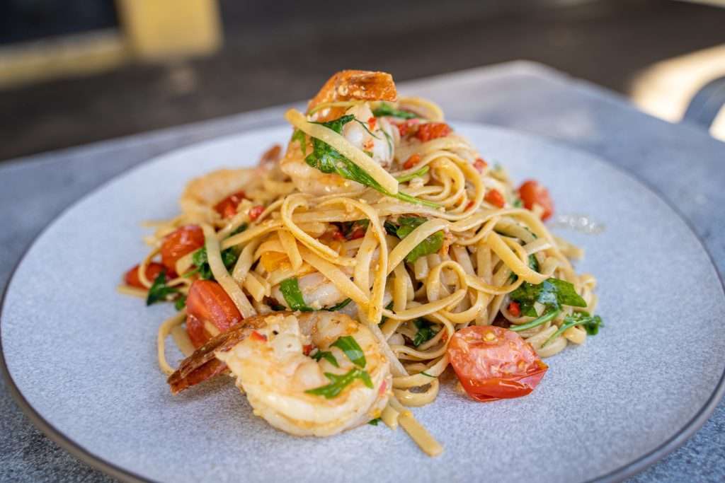 Linguine with prawns, cherry tomatoes and herbs