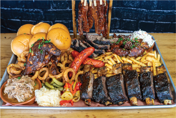 BBQ platter for 6 with ribs, sausage, pulled pork and sides
