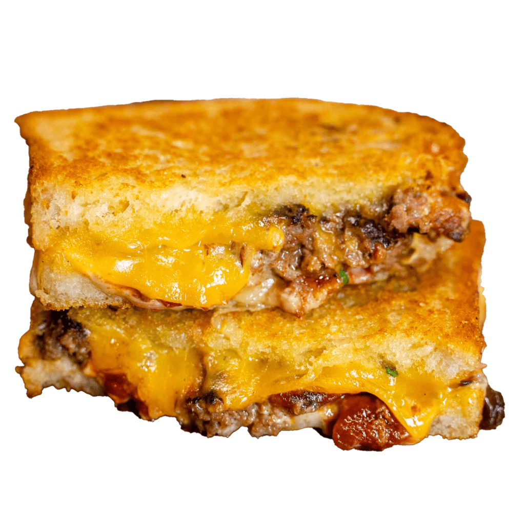 Cheeseburger Toast Tacular toastie halves with beef and melted cheese