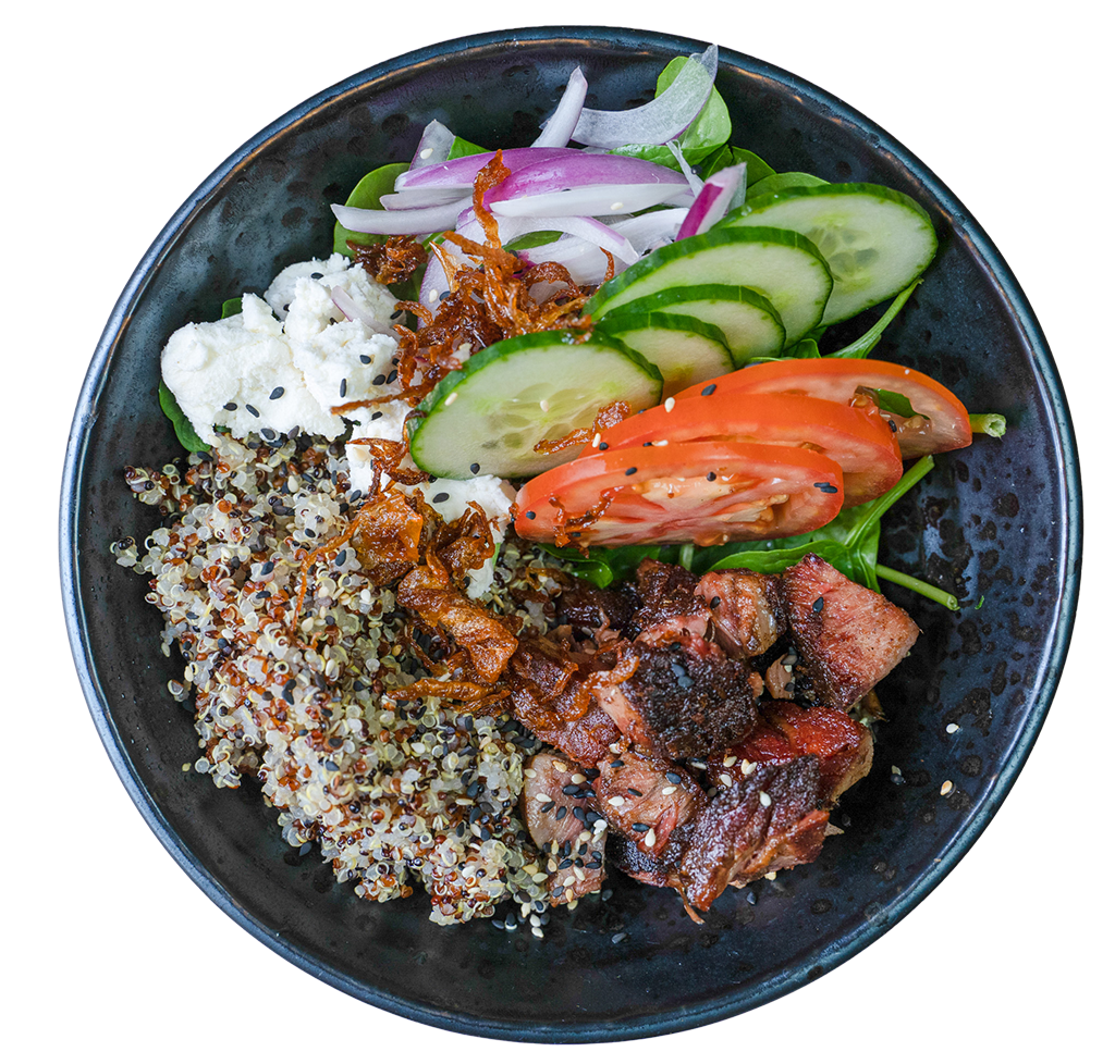 Greek bowl with grilled lamb, quinoa, tomato and onion