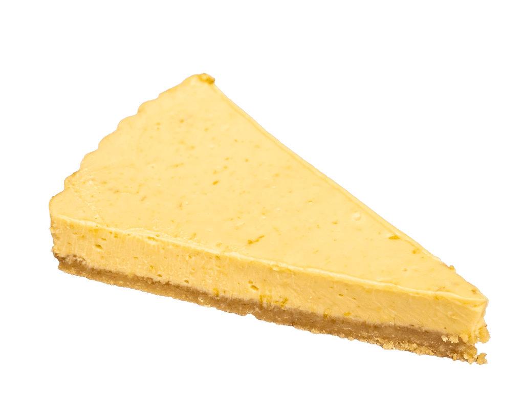 Wedge of key lime pie with a pale yellow filling