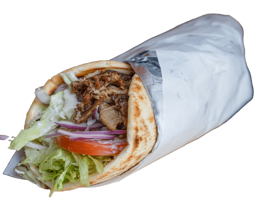 Lamb kebab wrap with lettuce, tomato and onion in foil