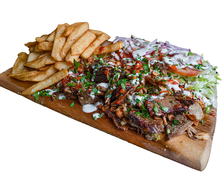 Mixed grill board with assorted meats, chips and herbs