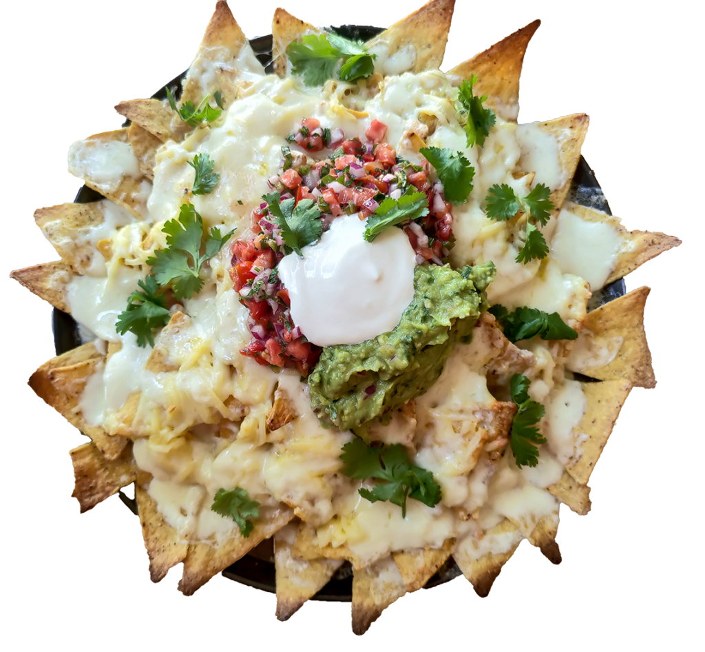 Loaded nachos with melted cheese, salsa, guacamole and sour cream