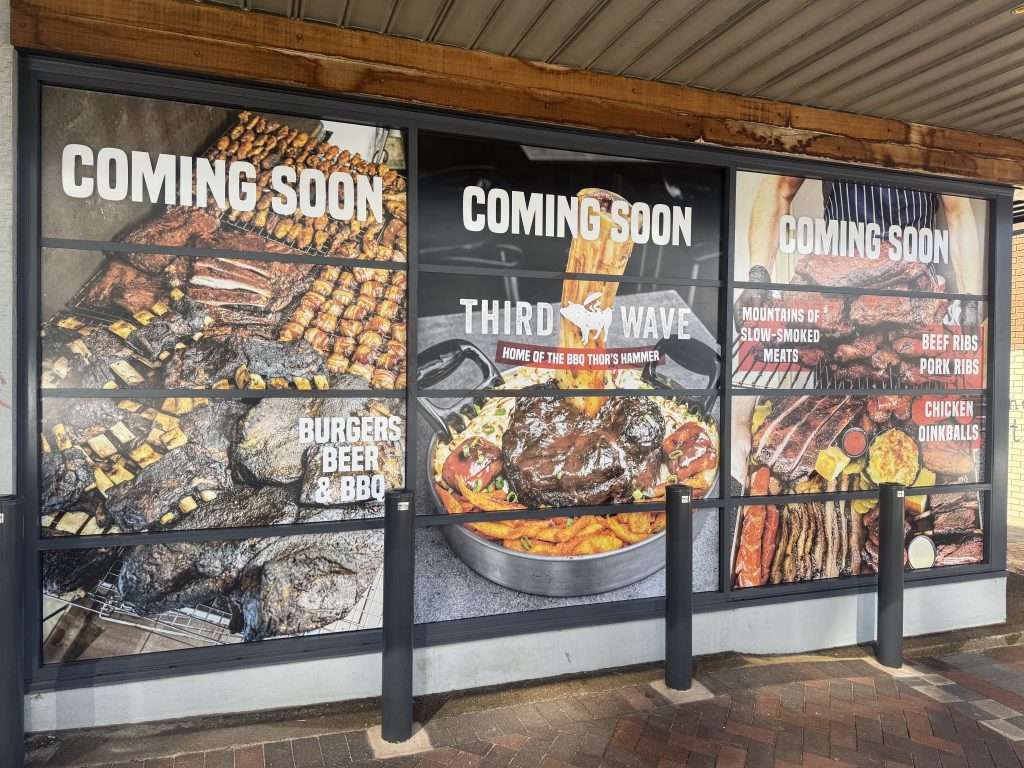 Coming soon signage in the shopfront window for Third Wave BBQ Gold Coast