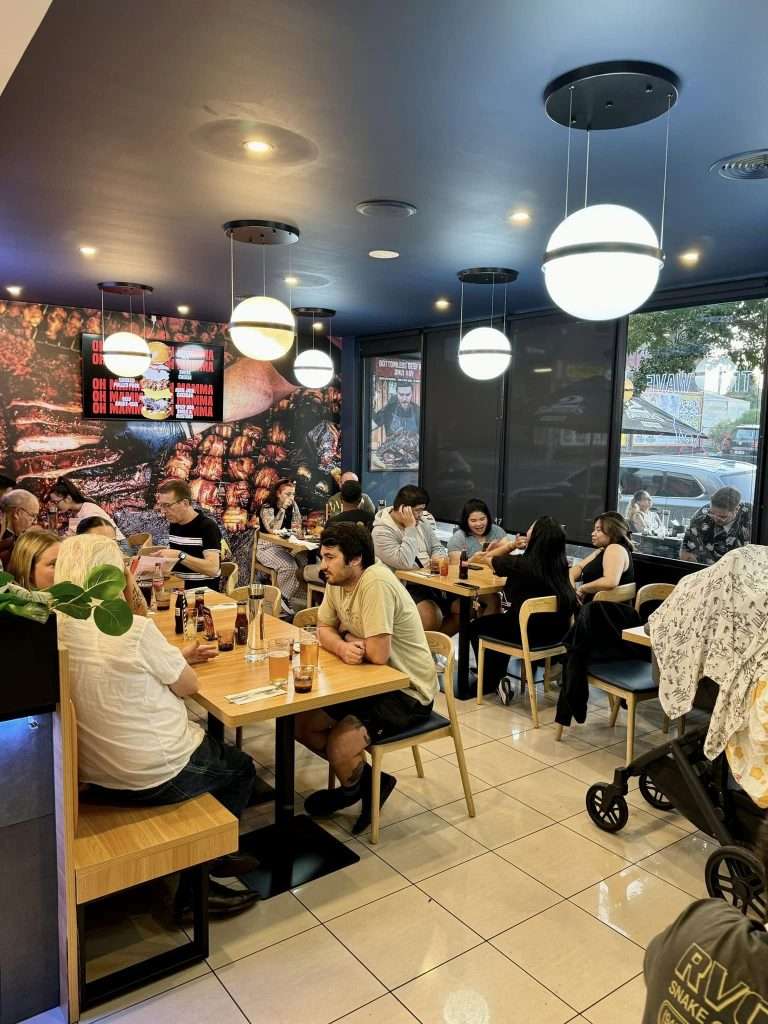 Dining room interior with guests at Third Wave BBQ Moorabbin