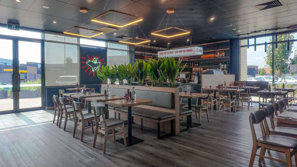Booth seating area at Third Wave BBQ Officer