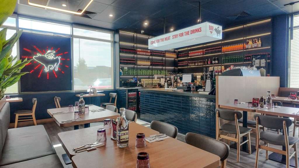 Bar and dining tables at Third Wave BBQ Officer