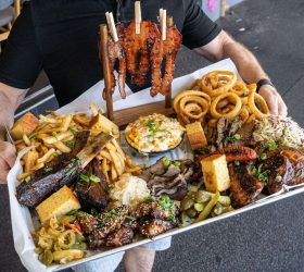 BBQ platter for 6 with ribs, brisket, fries and sides