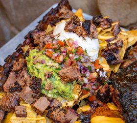 Hogzilla loaded nachos with brisket, guacamole and pico de gallo