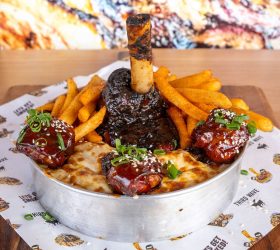 Mini Thor's Hammer with fries, glazed rib bites and flatbread in a tin