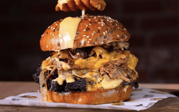 Oh Mamma burger with pulled meat and a waffle fry skewer