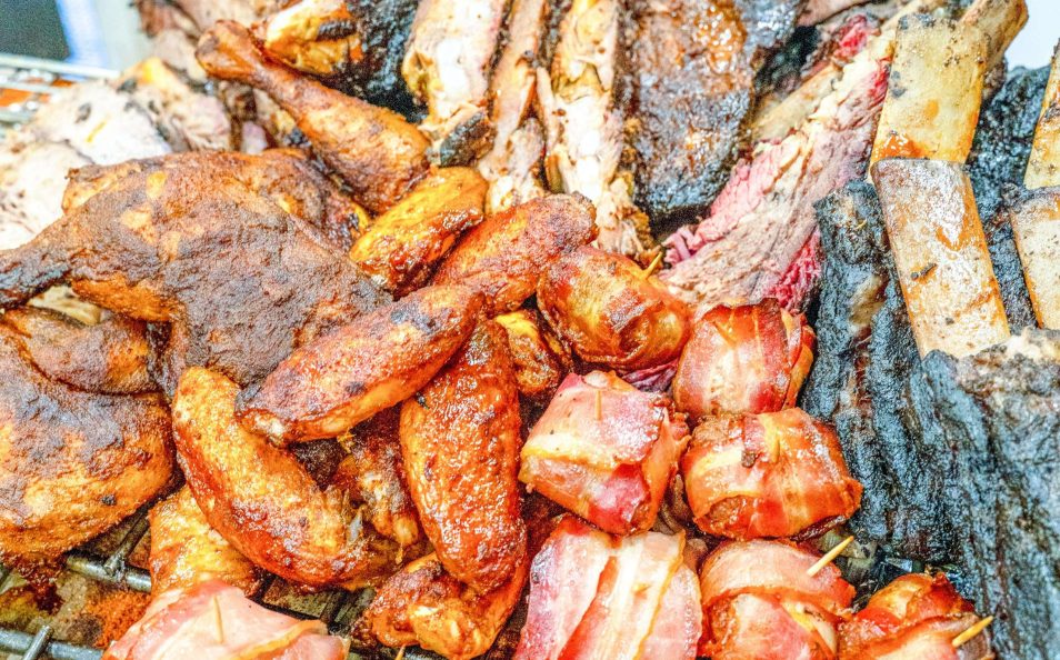 Ribs and bacon-wrapped bites fresh off the smoker