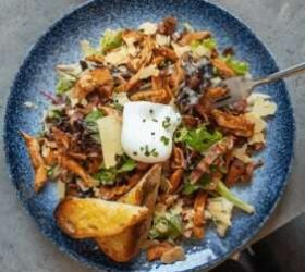 Loaded potato topped with crispy shallots and cheese