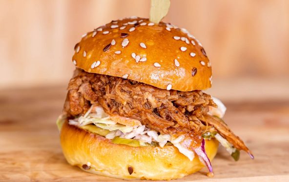 Pulled pork slider with coleslaw on a small bun
