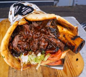 Thor's Hammer Kebab flatbread with a beef shin bone and shredded meat