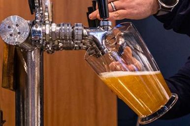 Beer being poured from a tap