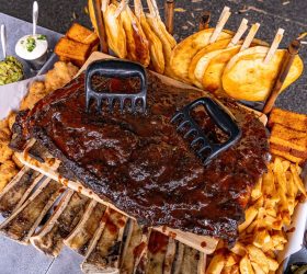 Flintstone's Yabba Dabba Platta rib slab with bear claws and sides