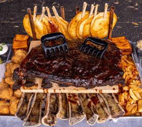 Overhead of the Flintstone's Yabba Dabba Platta with quesadillas and dips